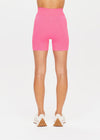 The Upside Ribbed Seamless 5in Spin Short in Neon Pink